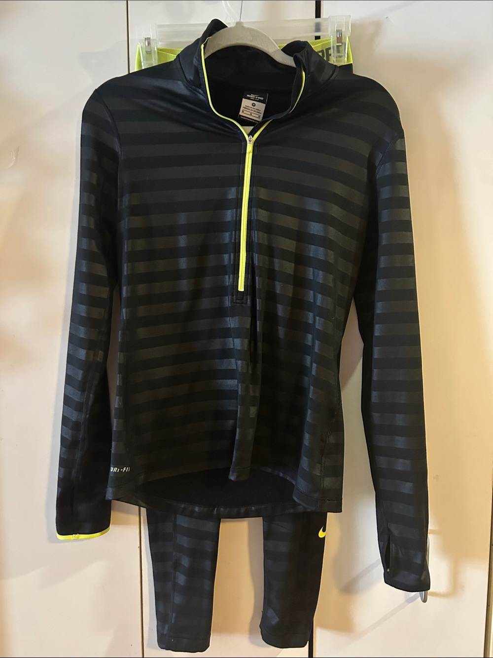 Nike women’s Black Striped Swim Rash Guard with Neon Yellow Trim